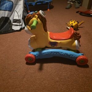 Fisher-Price Yellow and Red Ride-On Lion